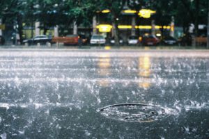 Rain scene on a city street.